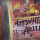 A Pokemon Charizard card signed by Arita.
